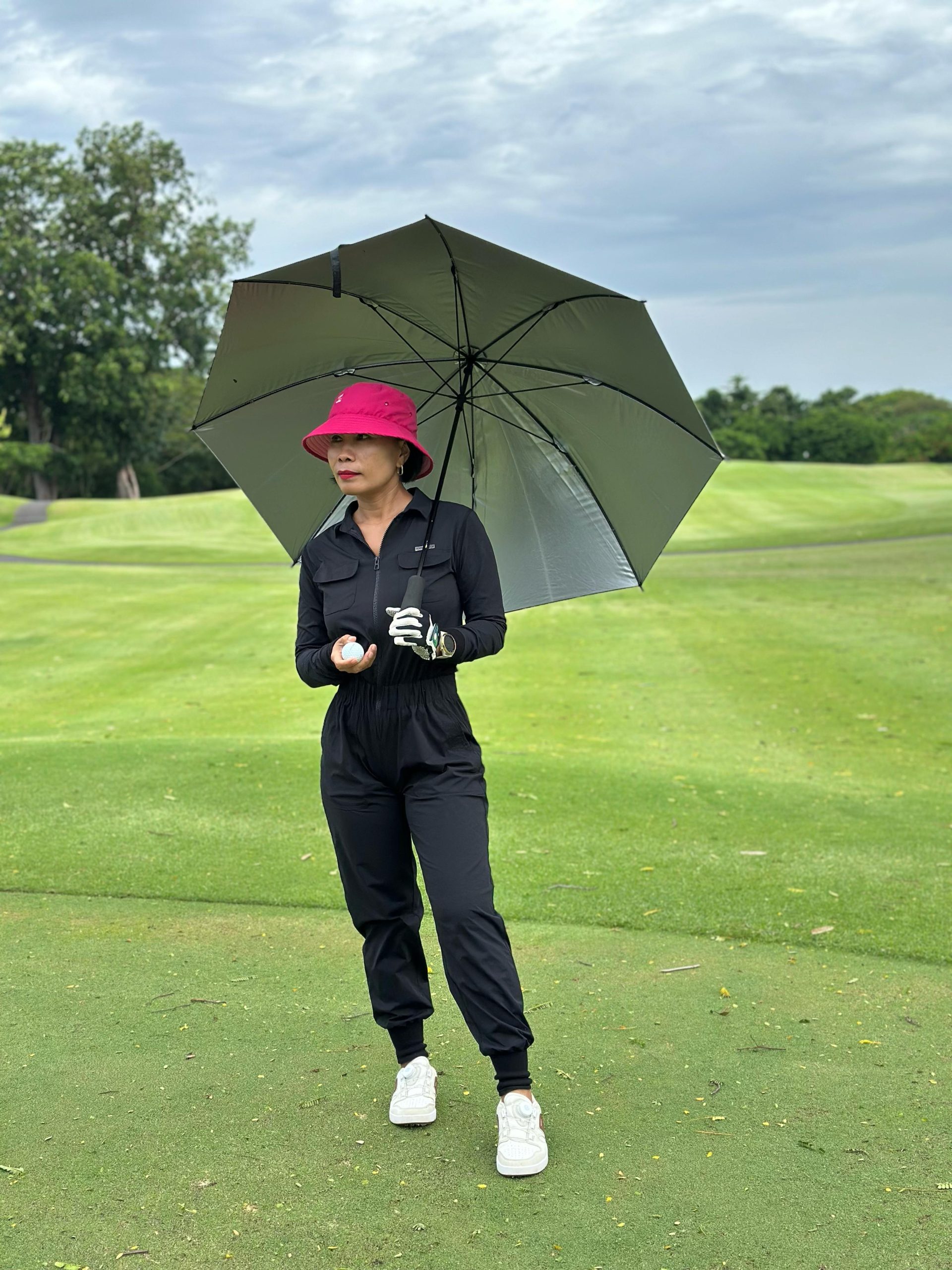LJS-001 || Ladies Golf Jumpsuit Long Sleeve with Collar Neck Black Color and Long Pants, with a Zipper in Front and 2 Pockets on The Right and Left of The Chest and Elastic Band on The Waist - Image 11