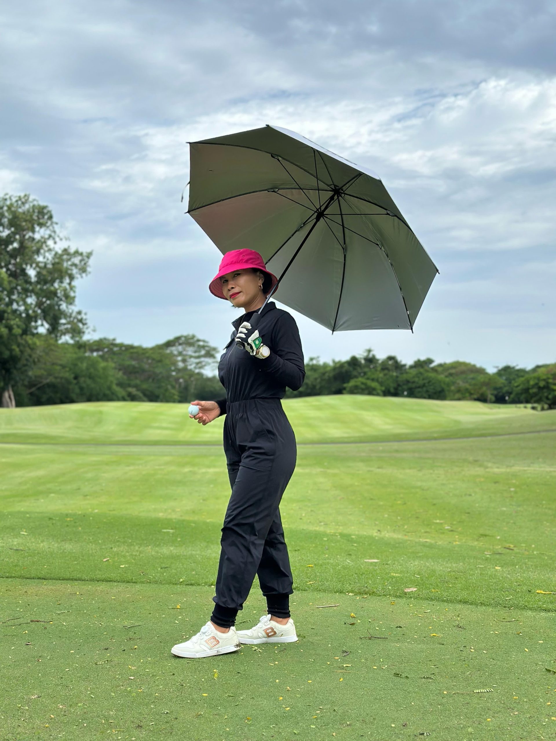LJS-001 || Ladies Golf Jumpsuit Long Sleeve with Collar Neck Black Color and Long Pants, with a Zipper in Front and 2 Pockets on The Right and Left of The Chest and Elastic Band on The Waist - Image 10