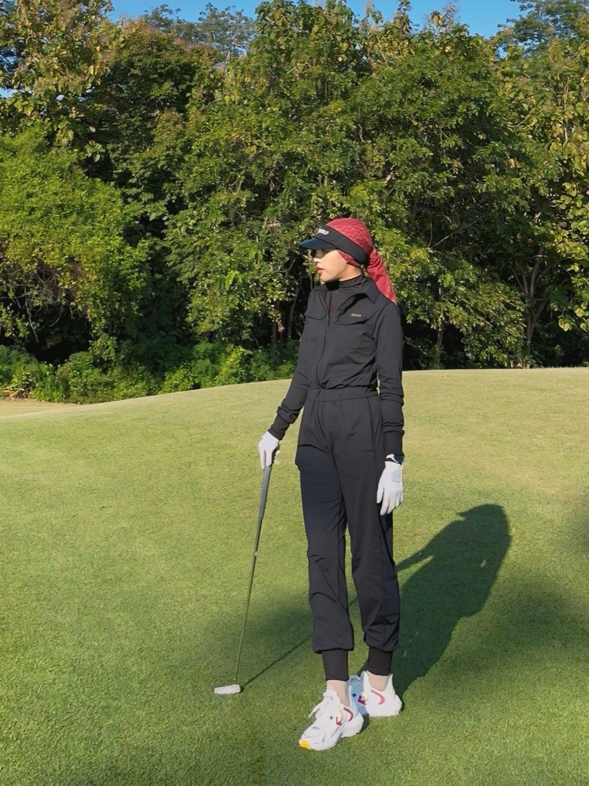 LJS-001 || Ladies Golf Jumpsuit Long Sleeve with Collar Neck Black Color and Long Pants, with a Zipper in Front and 2 Pockets on The Right and Left of The Chest and Elastic Band on The Waist - Image 6