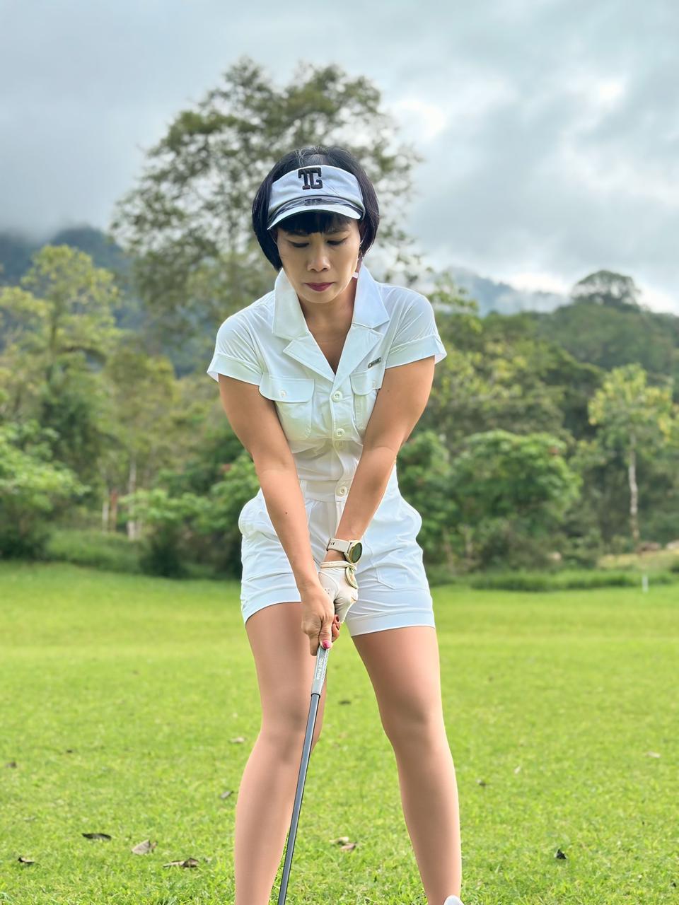 LJS-003A || Ladies Golf Jumpsuit White Color with Shawl Sollar, Short Sleeves with Shorts and Buttons in Front and 2 Pockets on the Right and Left Sides of the Front Chest - Image 2