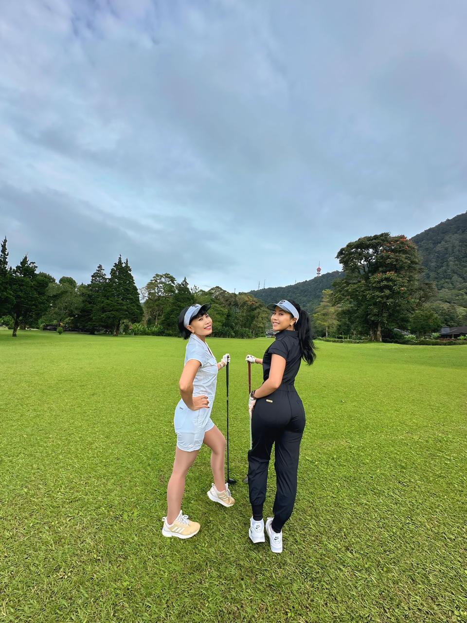 LJS-003A || Ladies Golf Jumpsuit White Color with Shawl Sollar, Short Sleeves with Shorts and Buttons in Front and 2 Pockets on the Right and Left Sides of the Front Chest - Image 5