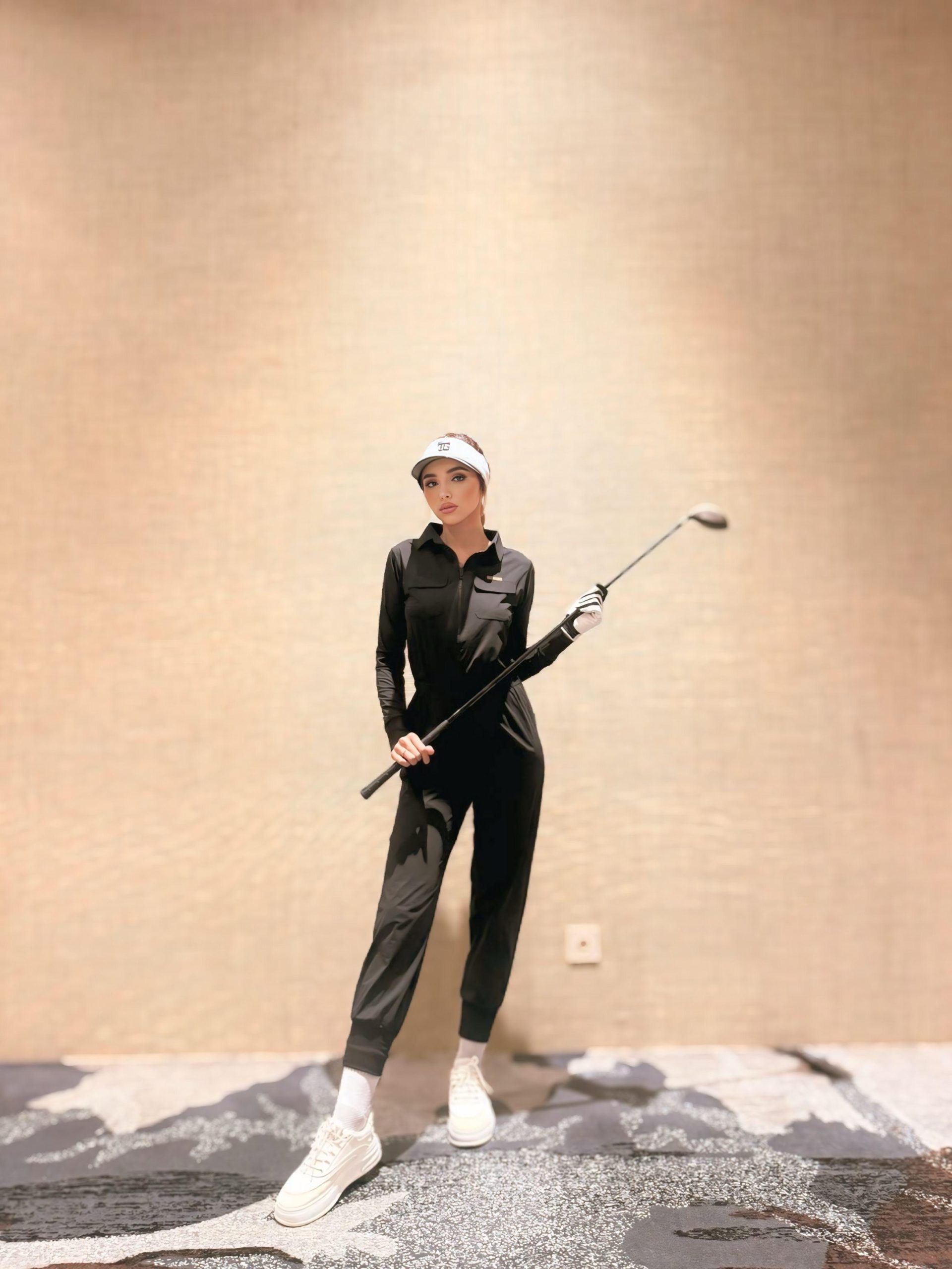 LJS-001 || Ladies Golf Jumpsuit Long Sleeve with Collar Neck Black Color and Long Pants, with a Zipper in Front and 2 Pockets on The Right and Left of The Chest and Elastic Band on The Waist - Image 2